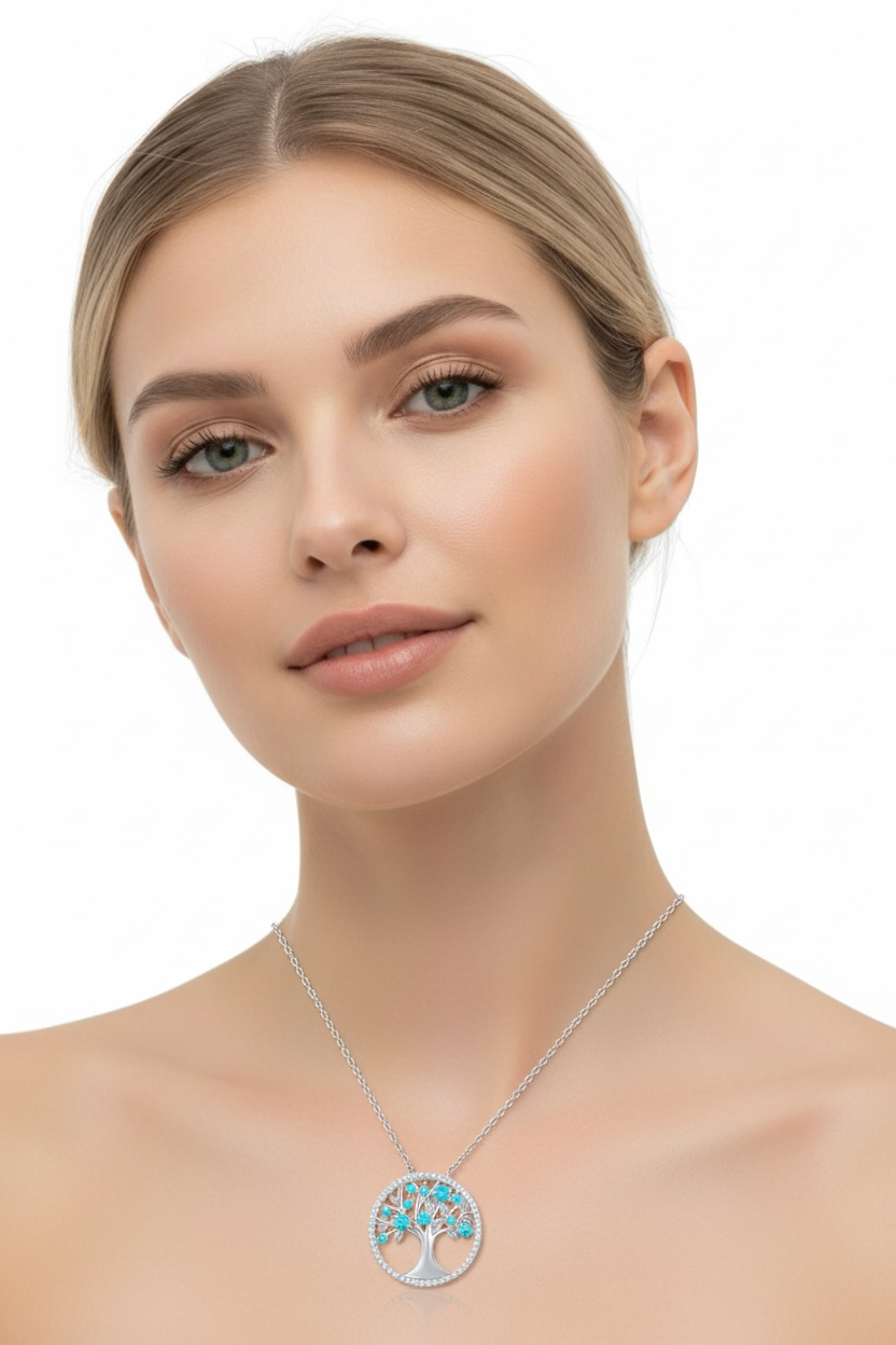 Sterling Silver, 'December' Birthstone Tree of Life Necklace - Blue Topaz CZ
