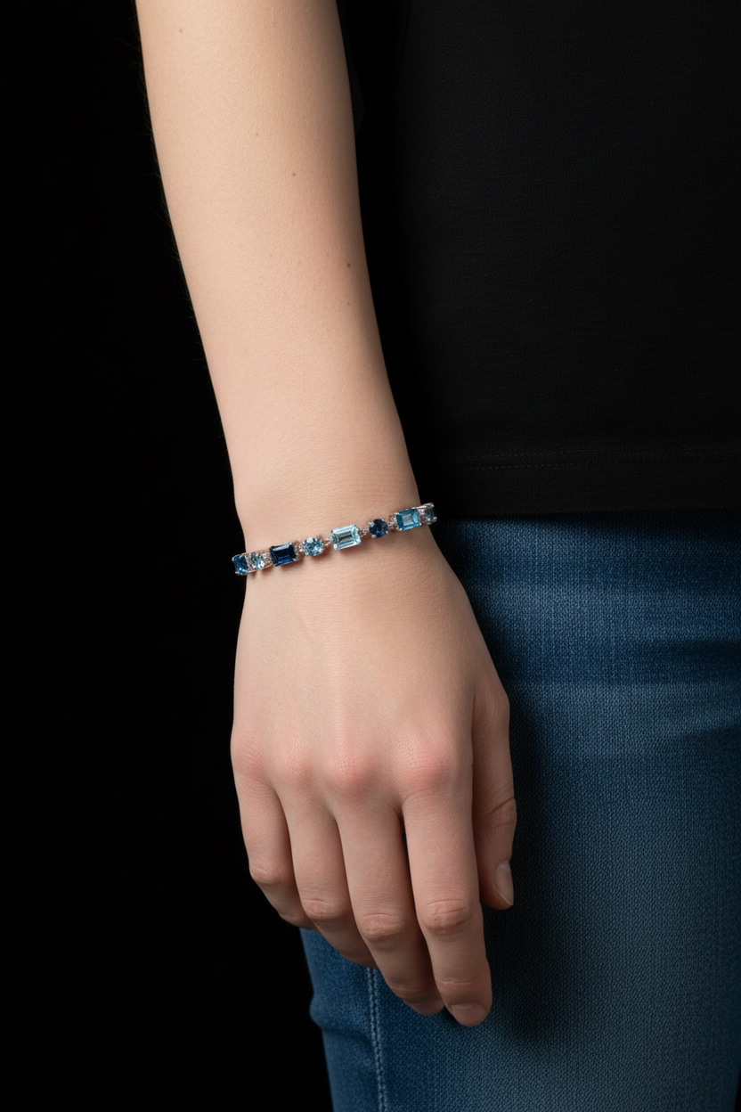 Sterling Silver Round & Emerald-Cut 17.05cttw Gem Bracelet - Swiss, London, & Sky Blue Topaz