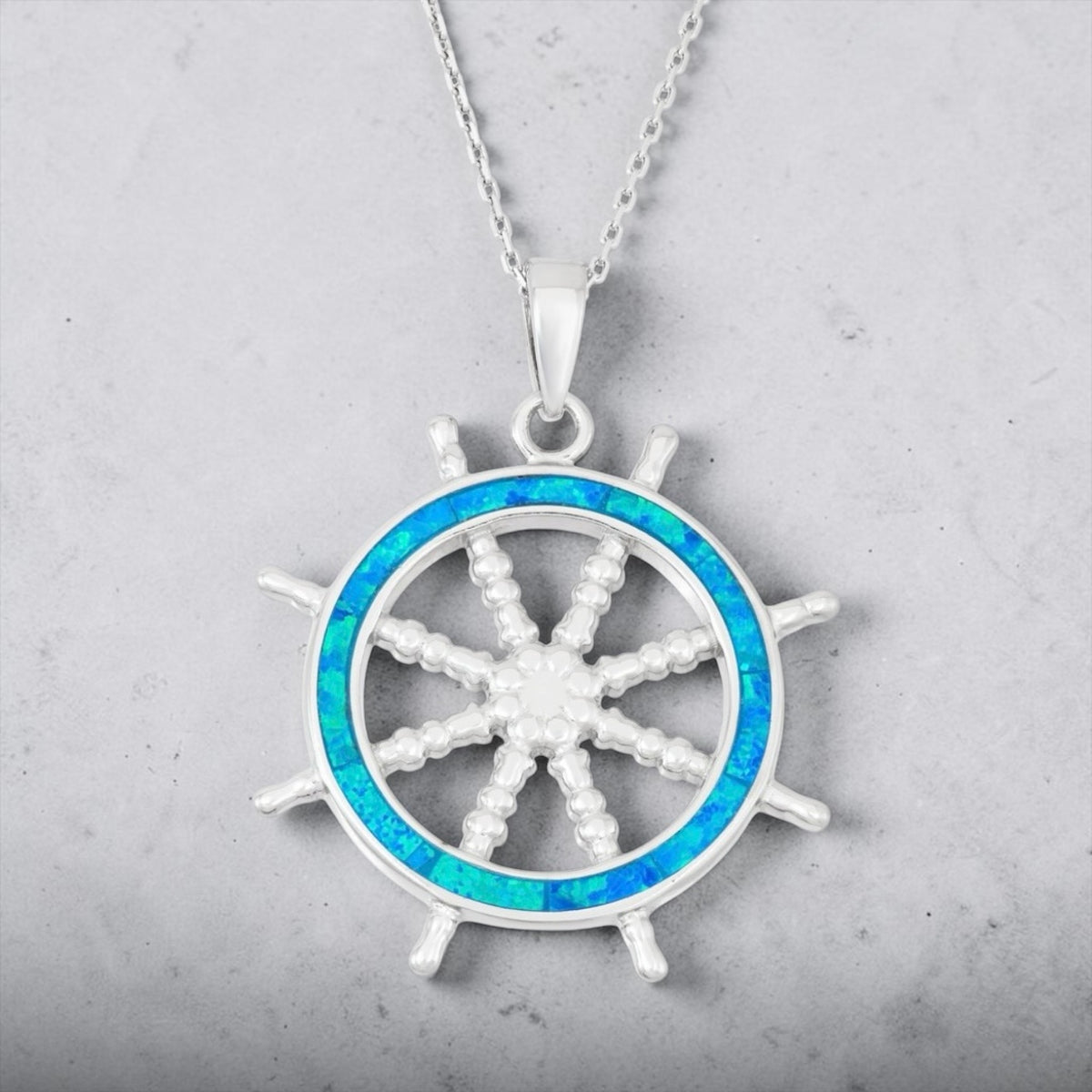 Sterling Silver Blue Inlay Opal Ships Wheel Pendant