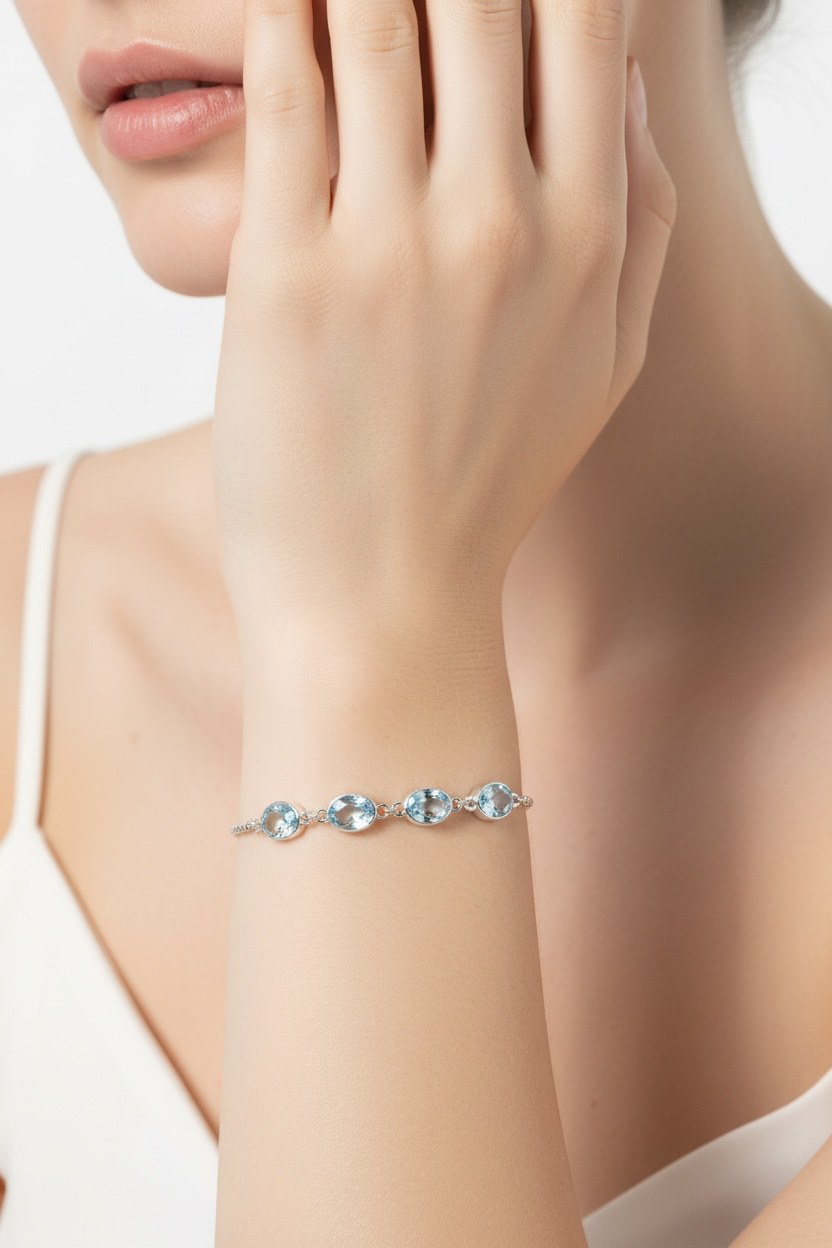 Sterling Silver, 7.85cttw Oval, Linked Adjustable Bolo Bracelet - Blue Topaz