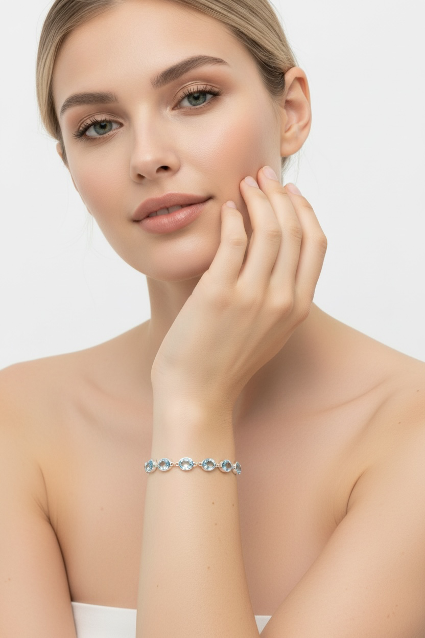 Sterling Silver, 7.85cttw Oval, Linked Adjustable Bolo Bracelet - Blue Topaz